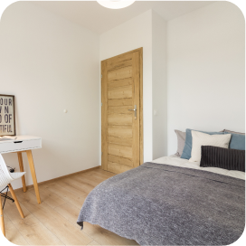 Sypialnia mieszkania przy ulicy Wichrowej zaaranżowany przez pośrednika nieruchomości DOMiTY.